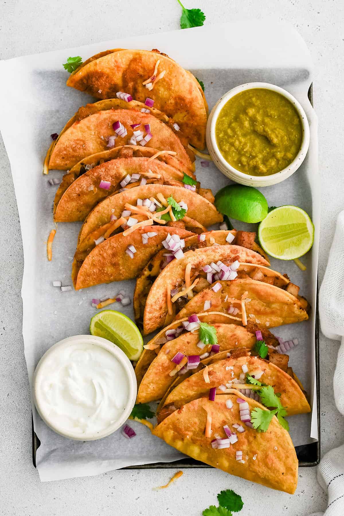 crispy potato tacos on a sheet pan
