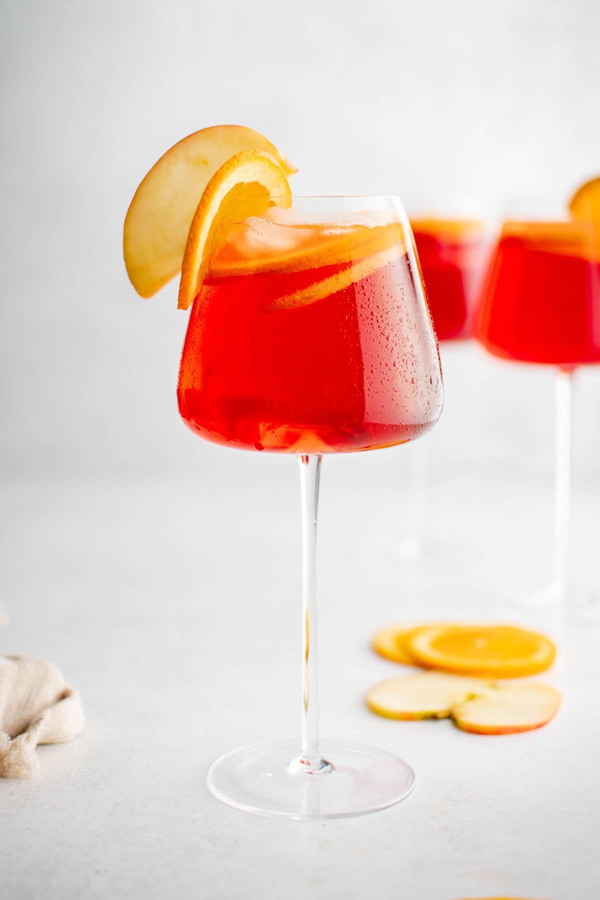 fall aperol spritz in a wine glass