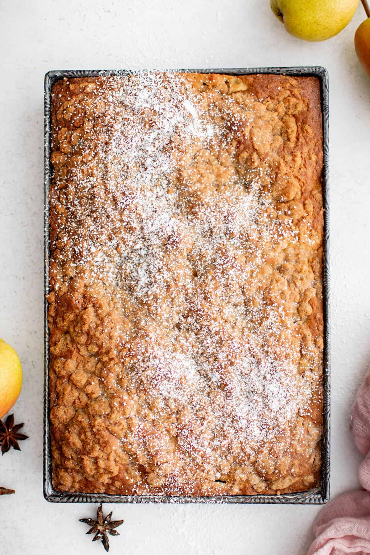 chai spiced pear breakfast cake in a cake pan
