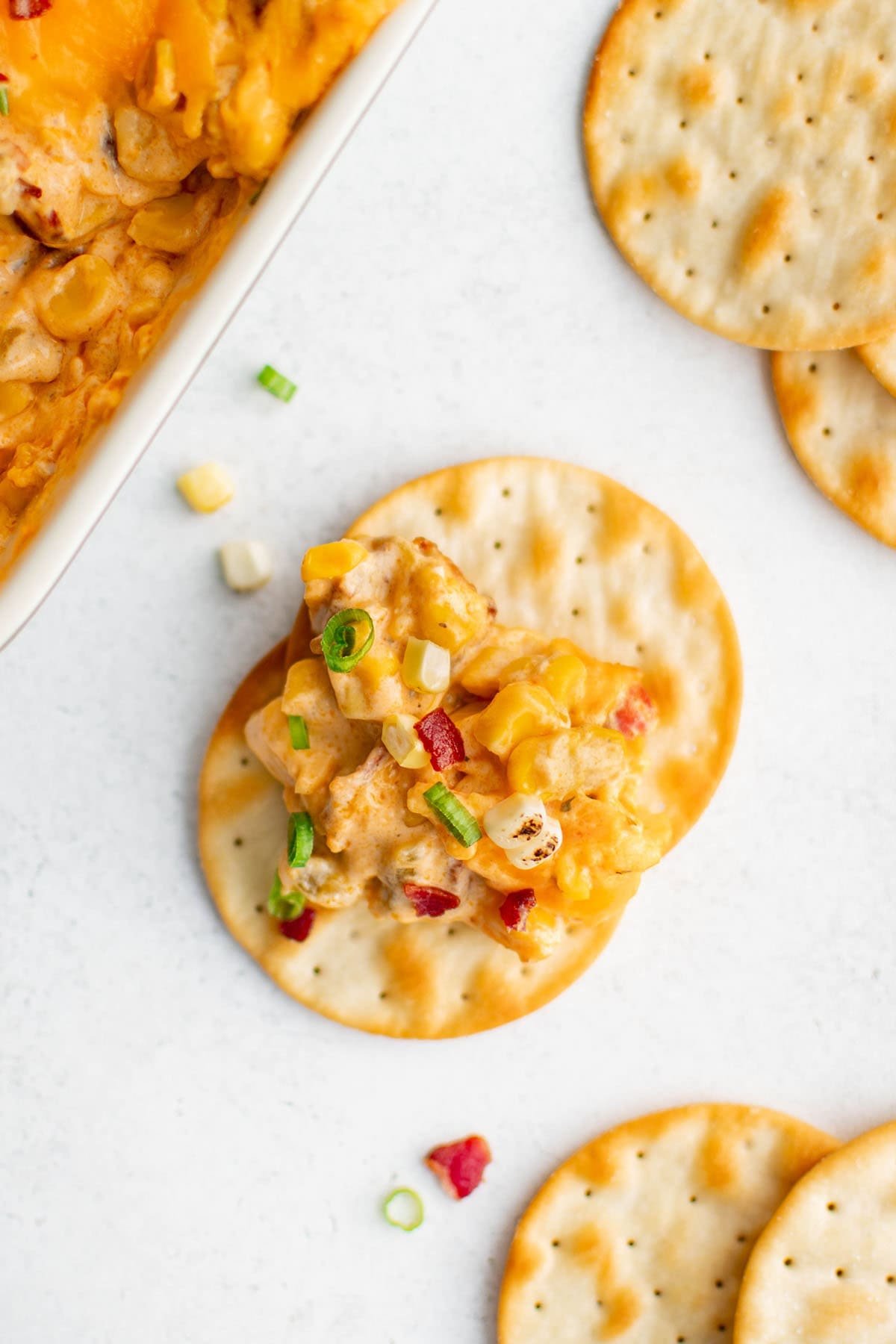 cheesy buffalo corn dip on a cracker