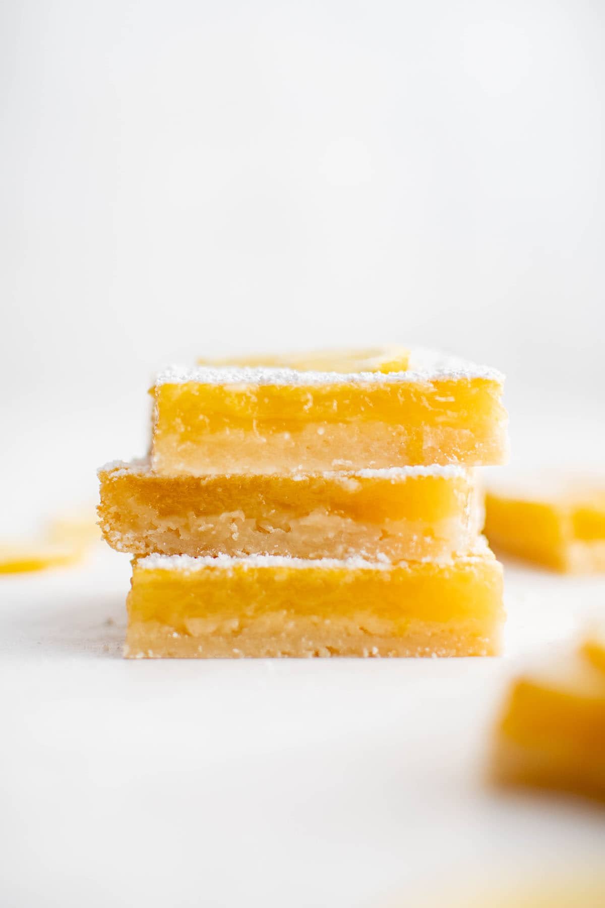 side view of lemon bars stacked upon each other