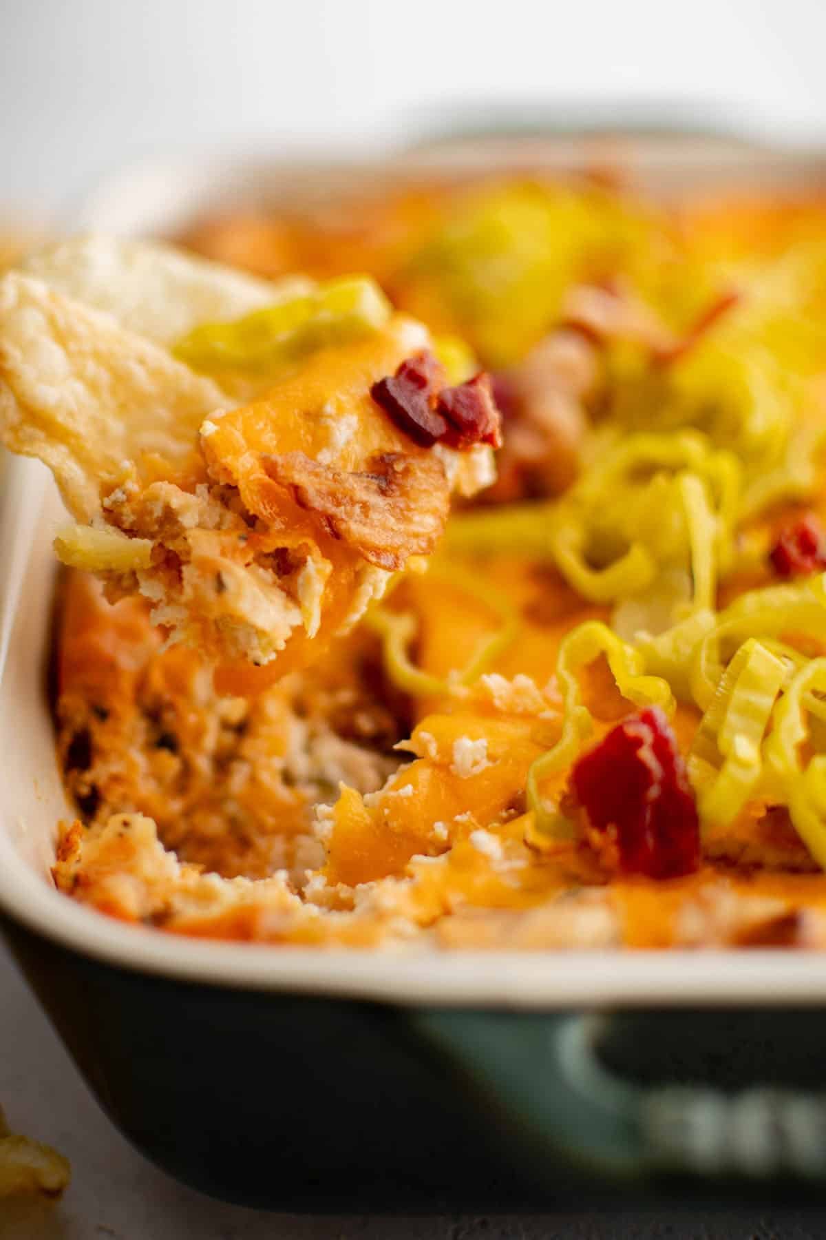 pepperoncini dip scooped onto a chip