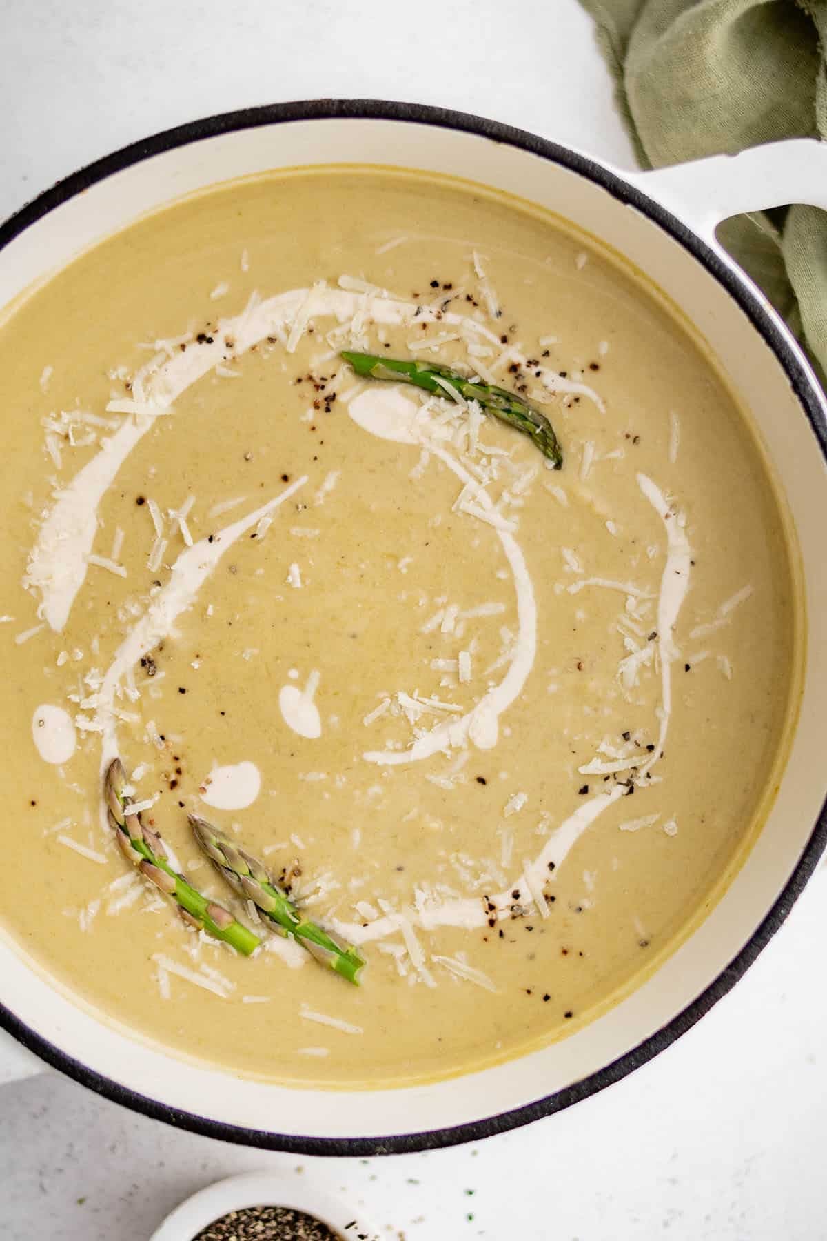 creamy asparagus soup in a soup pot