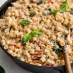 ditalini with creamy sun dried tomato sauce in a pan