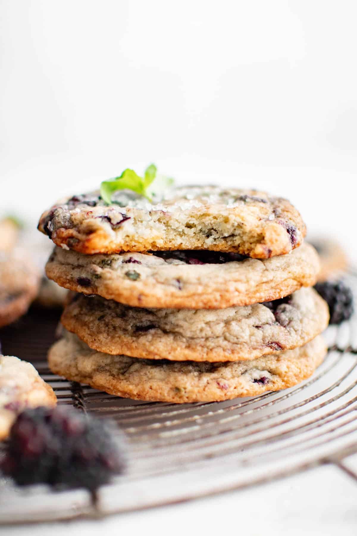 blackberry basil cookies stacked on top of each other