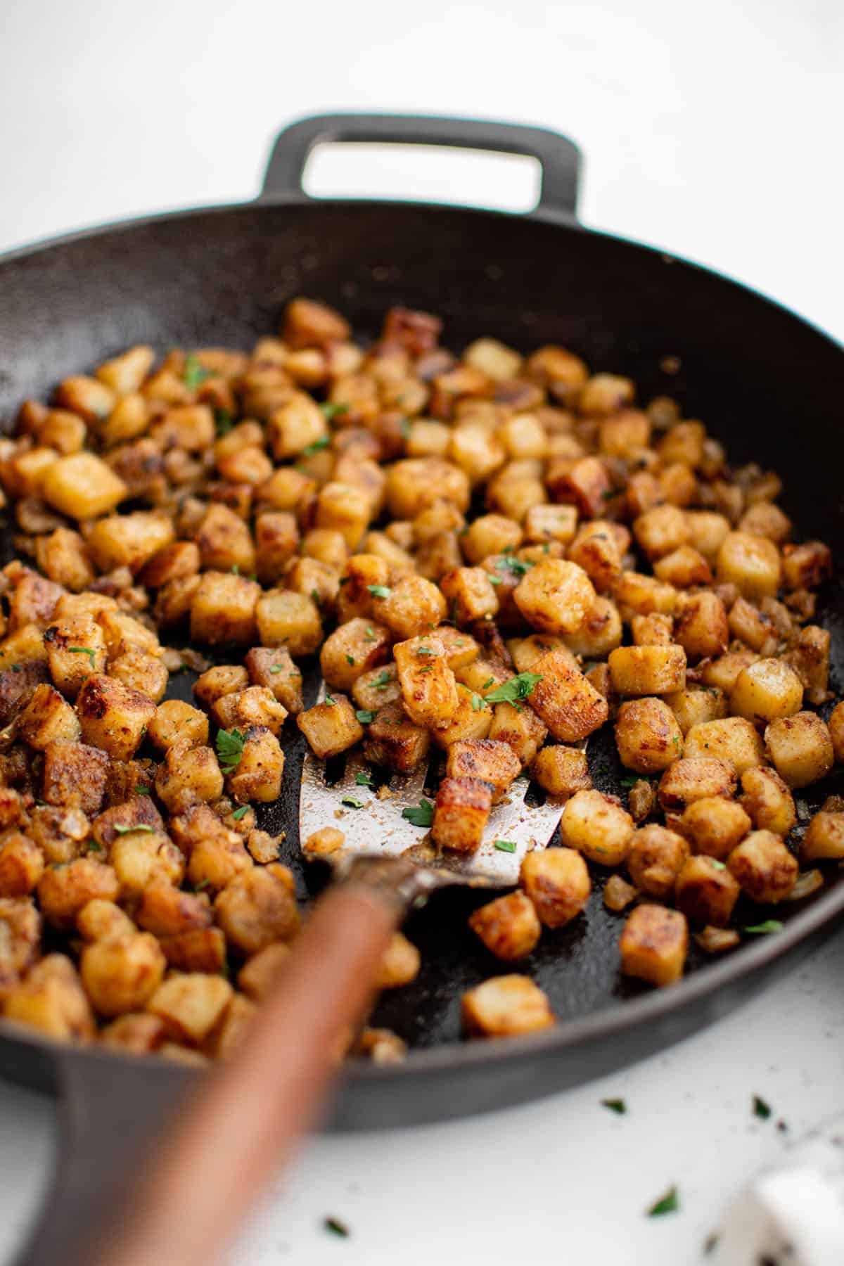 home fries in a cast iron skillet