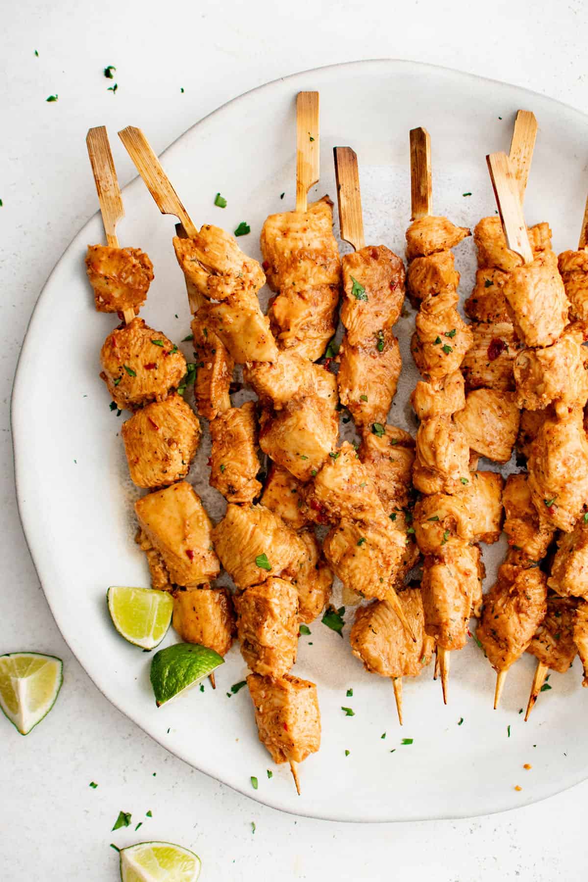 honey chipotle chicken kabobs on a plate