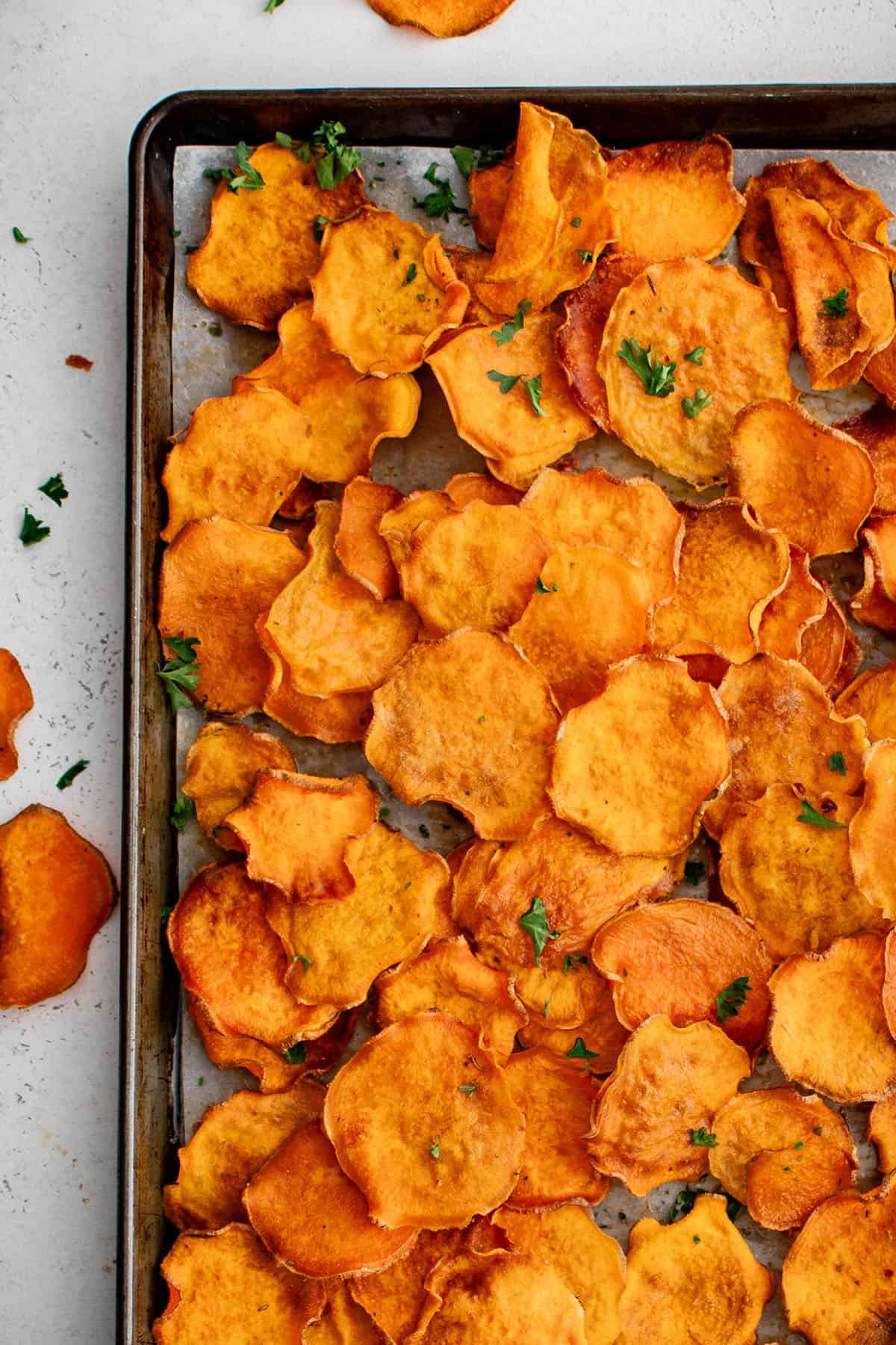 sweet potato chips on a sheet pan