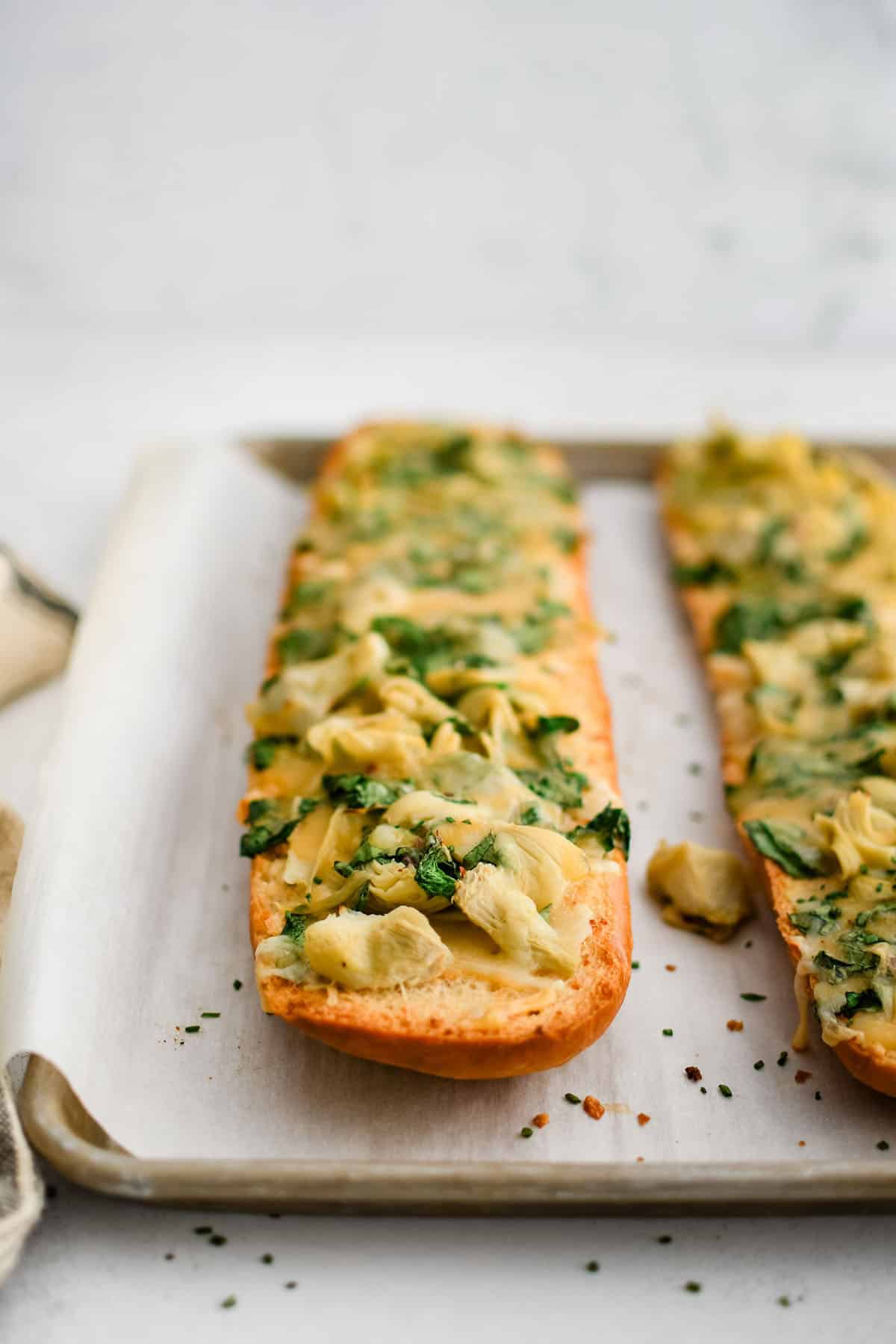 Spinach Artichoke French Bread Pizzas