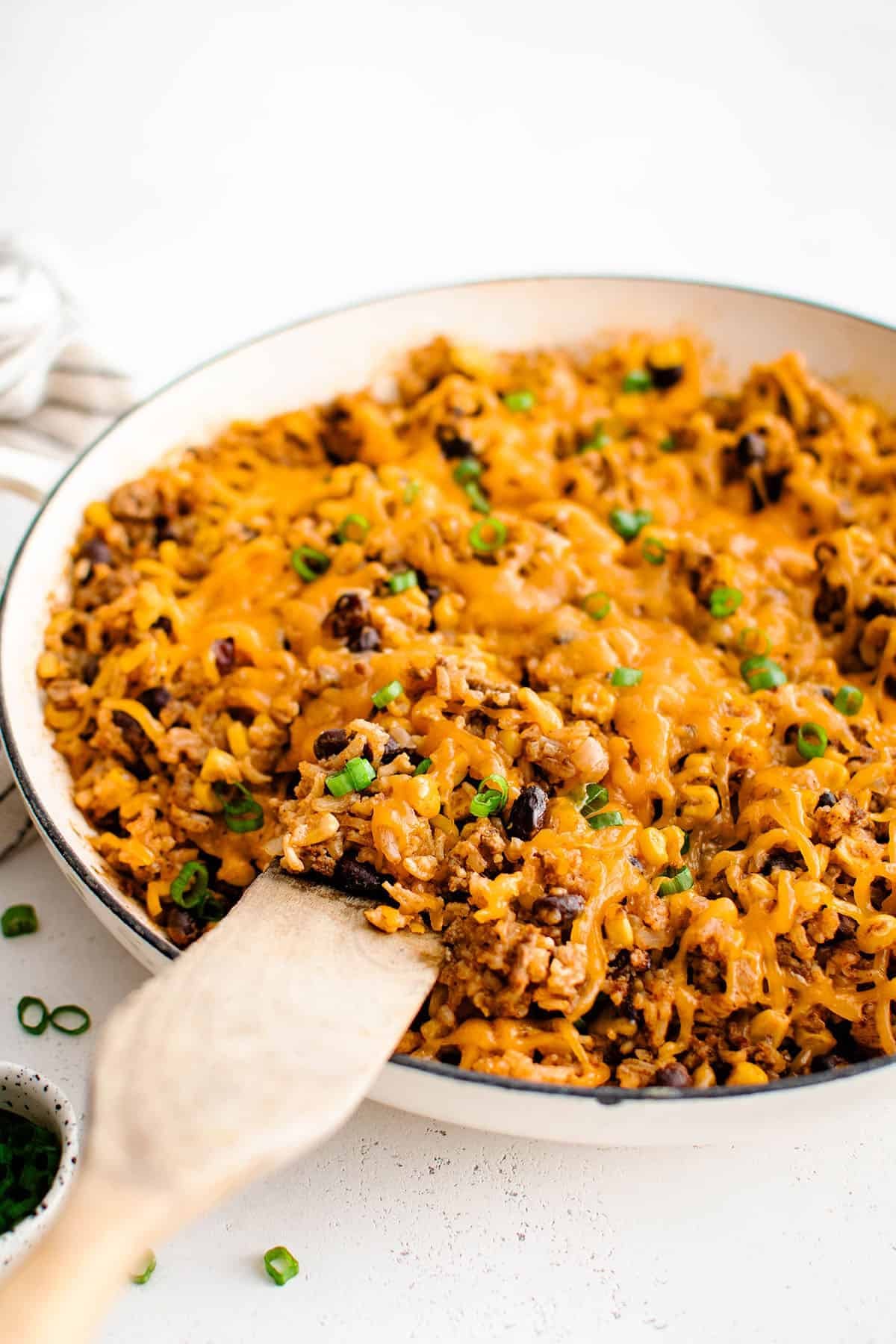 beefy enchilada rice in a white skillet
