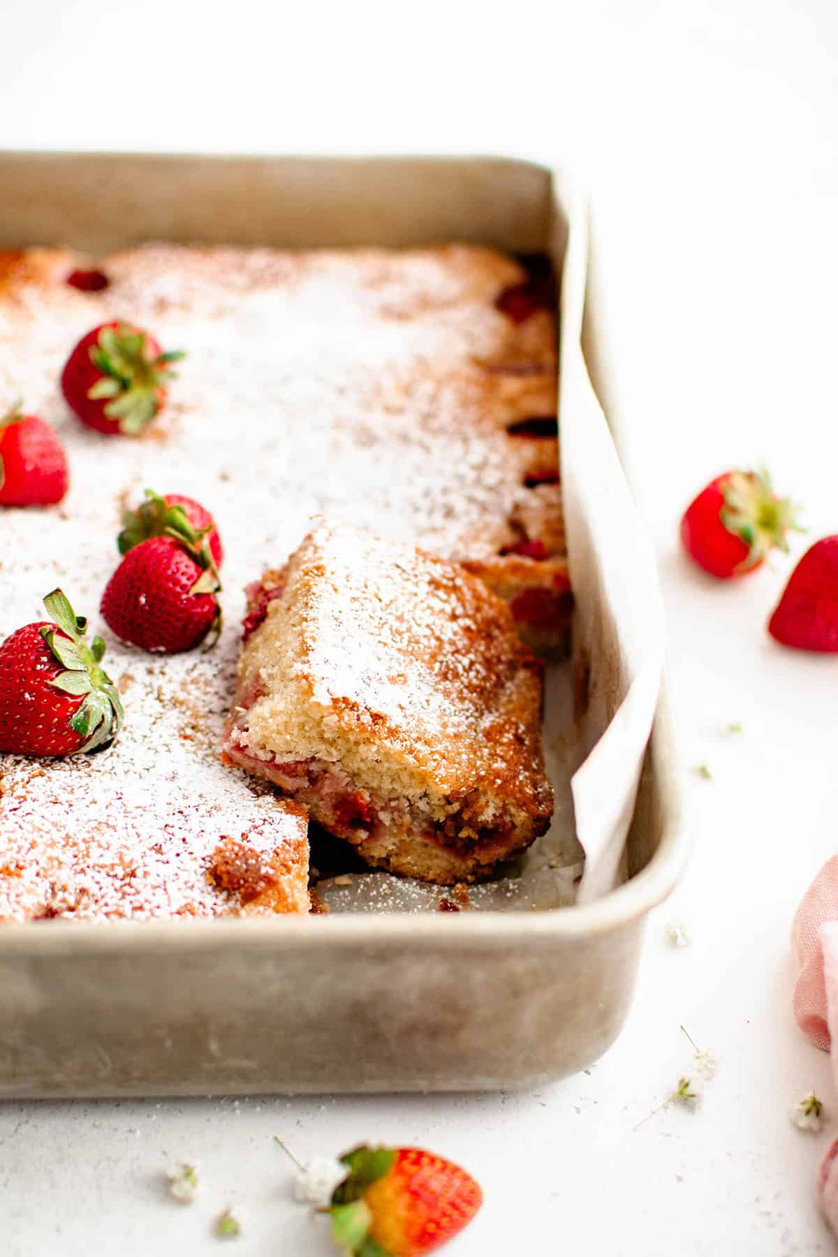 photo of strawberry cake in a baking pan