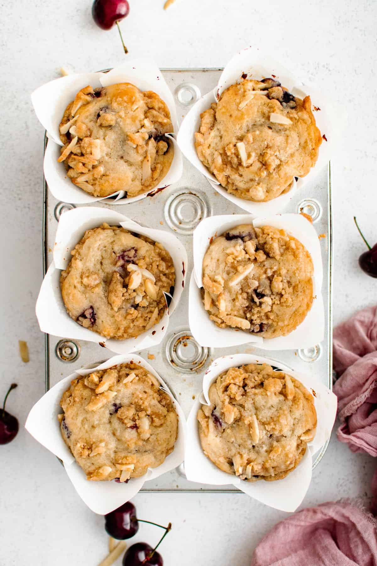 Summer Cherry Muffins in a muffin tin