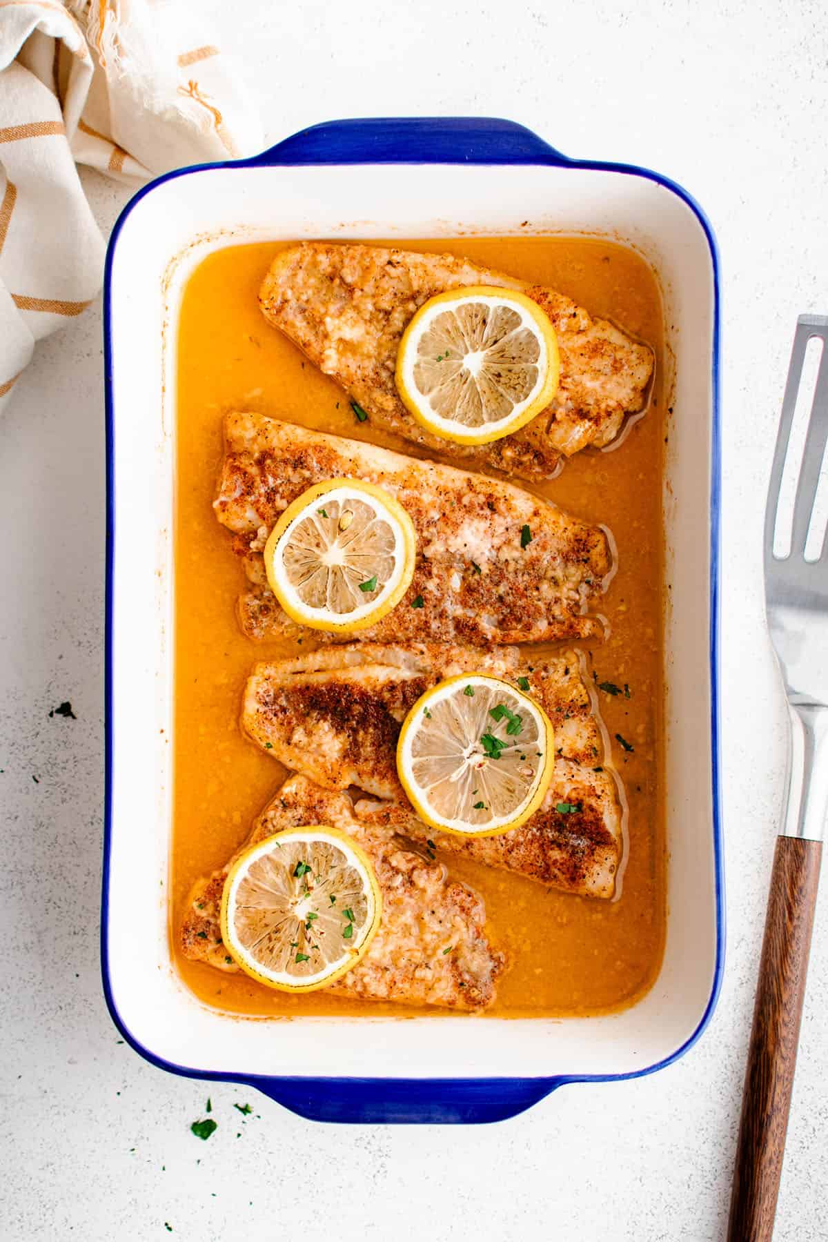 Lemon Garlic Butter Baked Fish in a baking dish