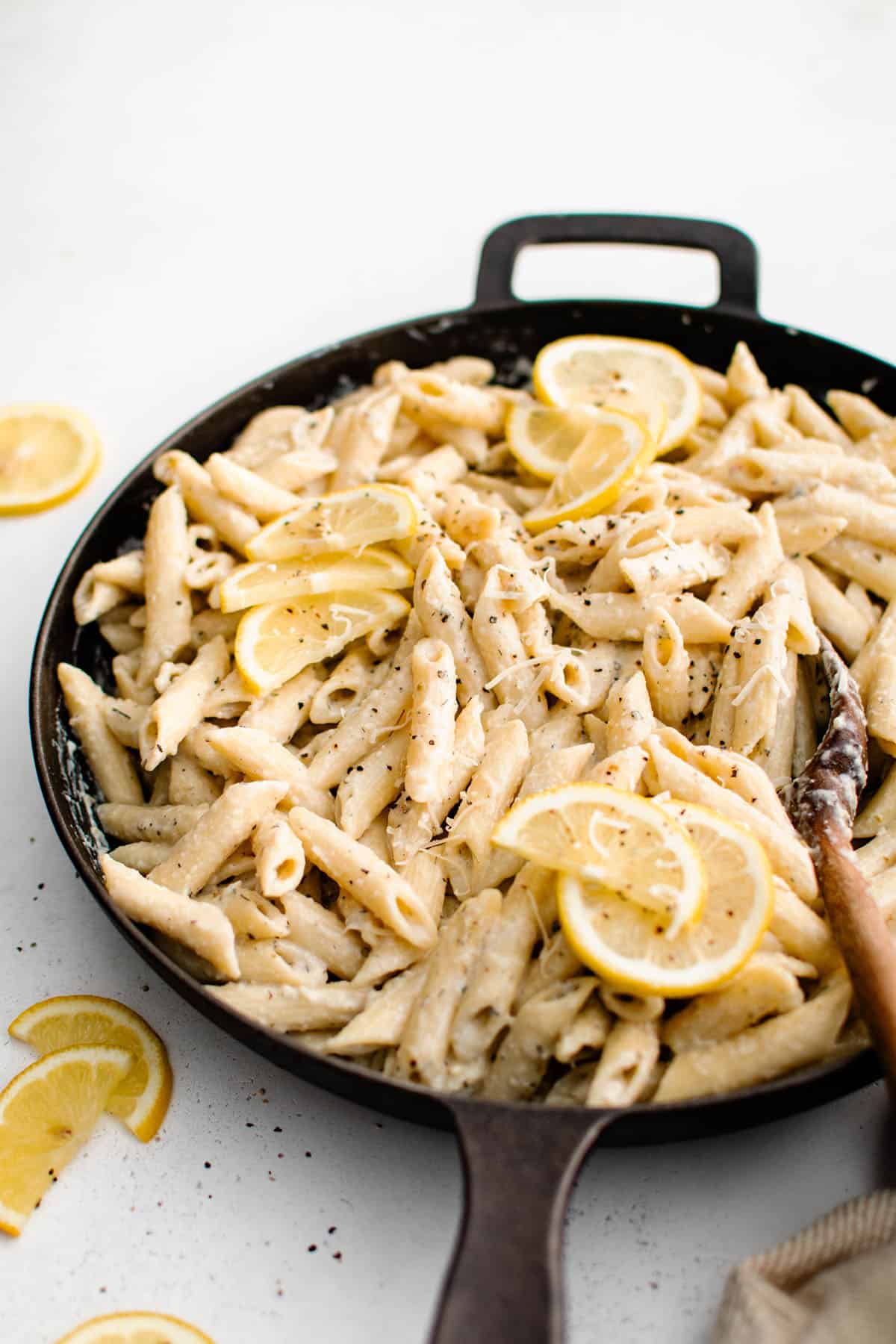 creamy lemon garlic pasta in a skillet